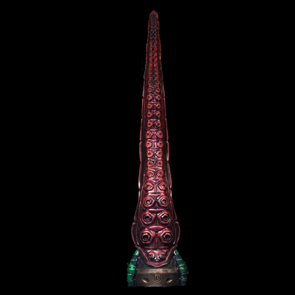 Side angle of The Sentinel anal depth trainer – platinum silicone, curved for deep insertion