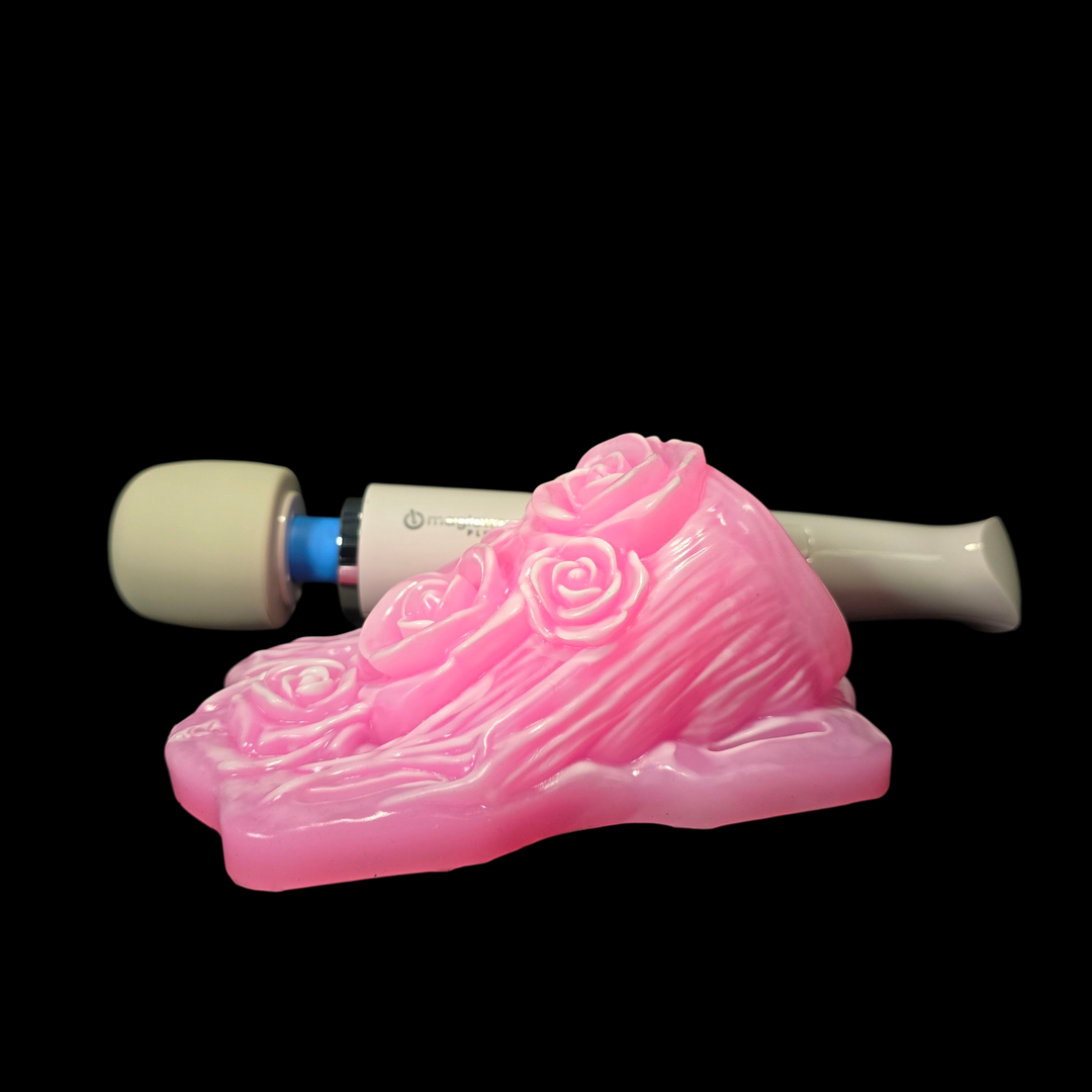 Pink log object with white accents on a black background