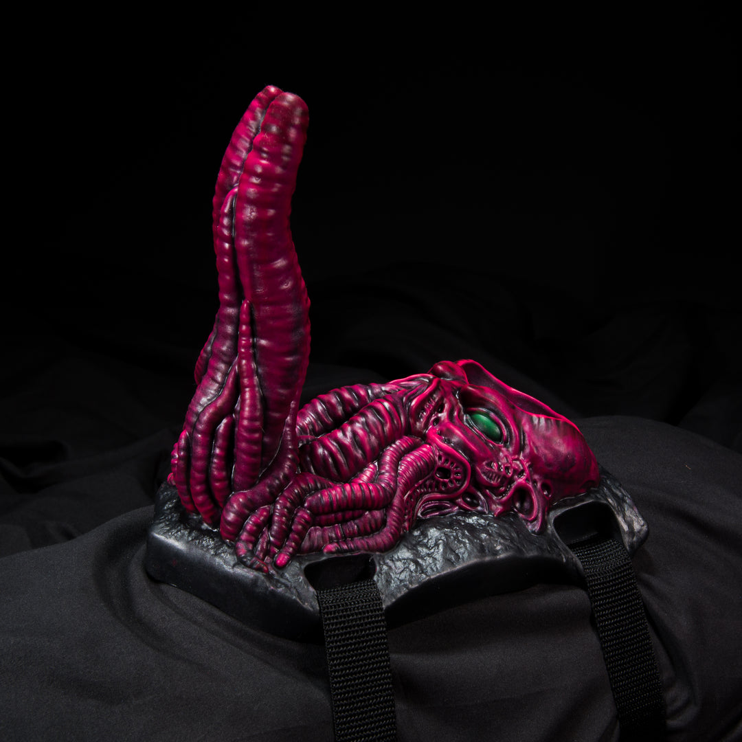 Strap Down Grinder sex toy in pink and black with tentacles