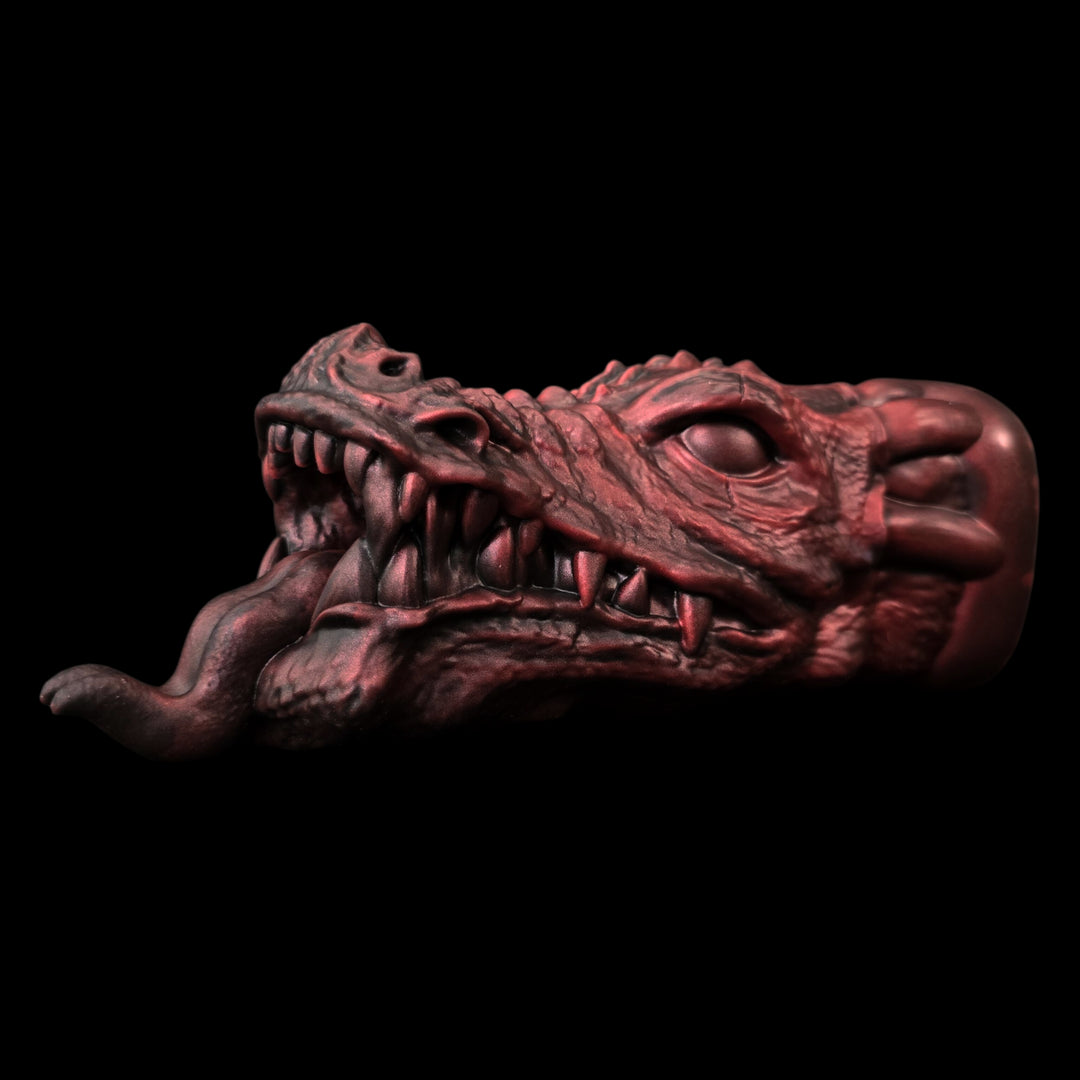 Dragon head Sex Toy in Red on a black background