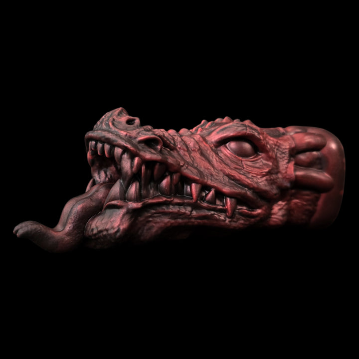 Dragon head Sex Toy in Red on a black background
