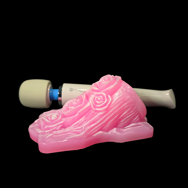 Pink log object with white accents on a black background