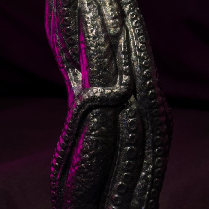 Tentacles in black with purple hue