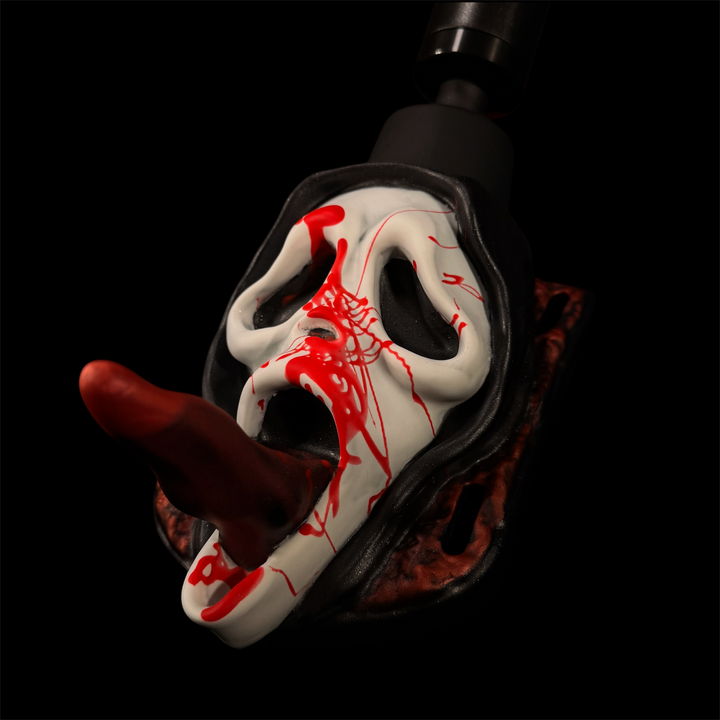 The Slasher dark romance wand grinder with white mask, black hood and red tongue